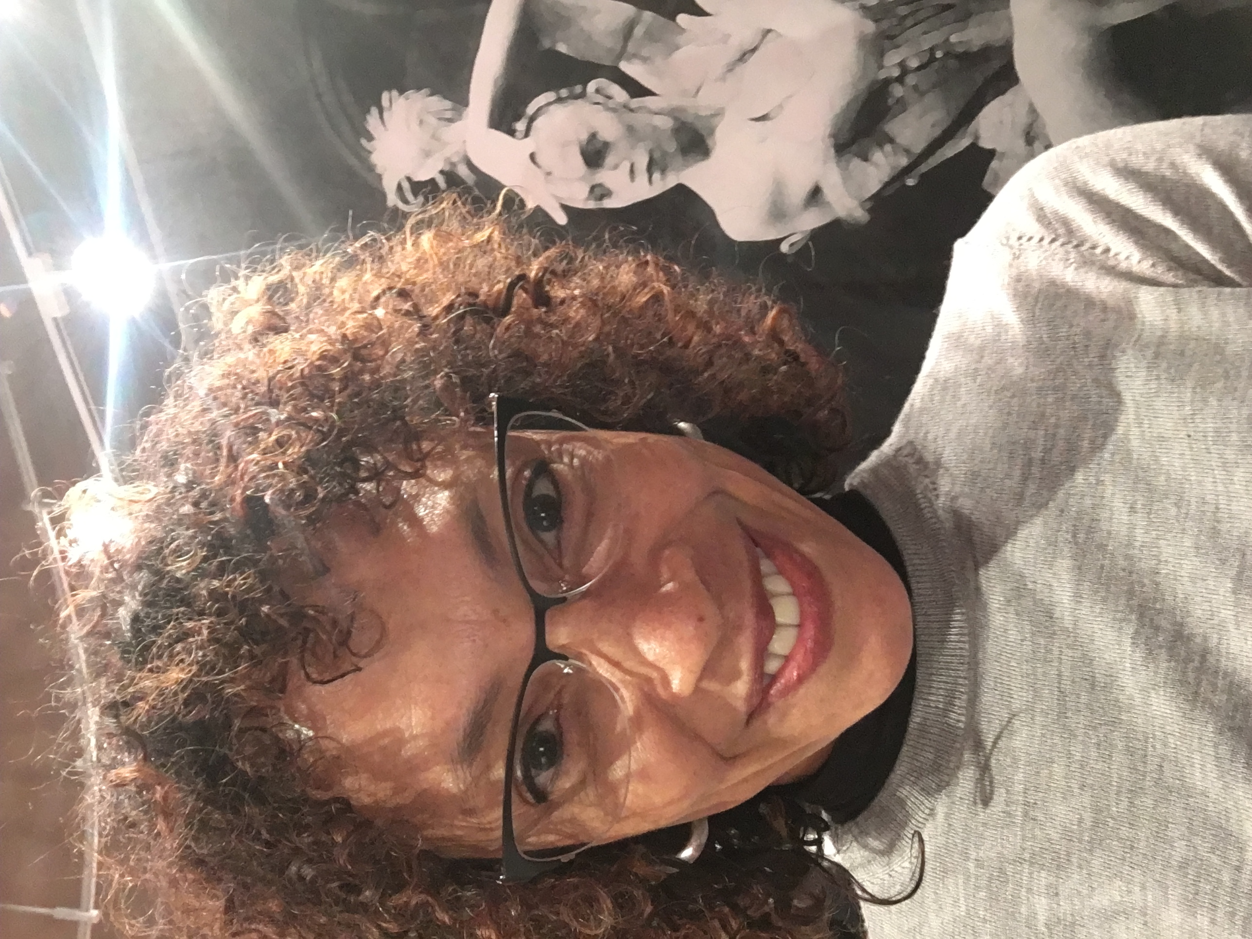 Judy Tyrus installing Dance Theatre of Harlem: 40 Years of Firsts Exhibit at the National Museum of Dance